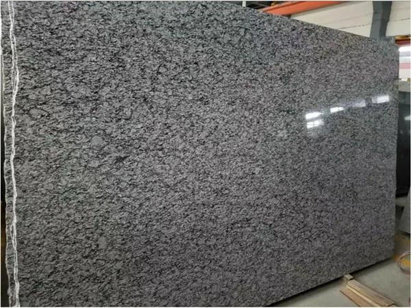spray white granite slabs