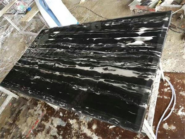 black marble  tile with white veins for desk