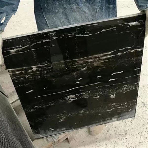 black marble  tile with white veins for floor